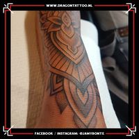 Black and grey Ornamental tattoo on the forearm. Designed and tattooed by: Jamy Bonte Dragon Tattoo.