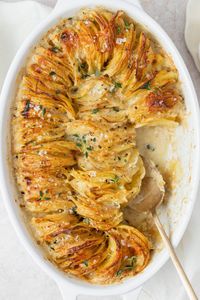 These creamy scalloped potatoes have a rich, cheesy sauce and nice crispy edges. They're the perfect side dish for any holiday meal or paired with a perfectly cooked sous vide steak!