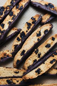 Italian Biscotti with dried cherries and dark chocolate. A delicious cookie recipe that is perfect to give as a gift or make for the holidays. And it is such an easy dessert that will make you into a biscotti lover! | asimplepalate.com #asimplepalate #biscotti #christmascookie #cookierecipe #holidaycookie #cookie