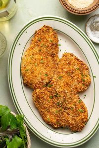 Easy, air fryer chicken cutlets recipe that yields thin, tender chicken breasts coated in Greek yogurt, spices, and a crispy panko-parmesan crust. A 20-minute gluten-free weeknight dinner packed with protein and absolutely delicious!