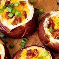 Macy Blackwell on Instagram: "Beer Cheese Soup in Pretzel Bread Bowls!🥨🧀🍻 The perfect comfort meal, and would be great to serve on game day! 🏈 Recipe by: @saltandlavendar Ingredients: 4 strips bacon (cut into small pieces) 1/2 medium onion (chopped) 2 sticks celery (chopped) 1/4 cup butter 2 cloves minced garlic 6 tablespoons flour 2.5 cups chicken broth 12 oz beer 1/2 cup heavy whipping cream 1 teaspoon Worcestershire 1 teaspoon Dijon mustard 2 cups sharp cheddar (grated) 1/4 cup scalli