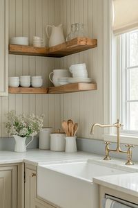 Explore the latest kitchen design trends with this charming rustic setup! Featuring open wooden shelves and vintage details, this design maximizes space and style. Perfect for those who love a blend of modern and classic elements. #kitchendesign #rustickitchen #homedecor