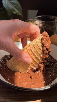 These homemade Choco Tacos are a fun, nostalgic treat that's perfect for summer! No churn fudge-swirled vanilla ice cream is stuffed inside a sweet and crispy waffle cone, then the whole thing is dipped in a chocolate and chopped peanut mixture.