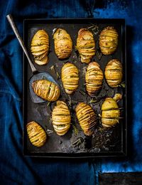 These gluten free duck fat hasselback potatoes are the perfect side dish for a dinner party. Rich, golden and immensely tasty – duck fat elevates everyday ingredients into something very special. Fat from any well-reared animal is a resource to be savoured and, if you render your own, it costs next to nothing