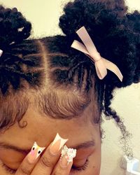 2 flower buns and cute pink bows #starterlocstyles #starterlocs #locstyles #locsassesories #locs #locstylesforwomen #naturalhaircare #naturalhairjourney