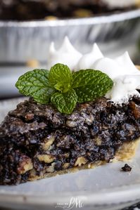 Chocolate Sawdust Pie reigns supreme. Combining the nuttiness of pecans, the sweetness of coconut, and the rich taste in every bite, this dessert is a masterpiece that delights the taste buds and warms the heart