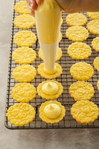 This Custard Creams recipe is a homemade version of the classic British biscuits. These delightful custard flavoured cookies are quick to make and perfect with a cuppa. When you have a batch these Homemade Custard Creams in the oven, your home will fill with their wonderful aroma. So let's get baking! #sugarsaltmagic #custardcreams #britishbiscuits #custardcookies