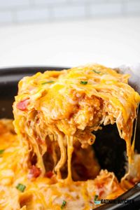 Super easy dinner idea for busy weeknights - slow cooker enchilada casserole. The perfect crockpot dinner recipe.