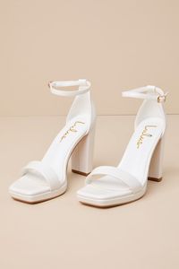 The Lulus Signie White Square-Toe Platform Ankle Strap Heels will be your favorite way to elevate any special occasion look all year long! Smooth faux leather shapes these trendy heels that feature a square toe bed (atop a 0.5"" toe platform) and a wide toe strap. A sturdy heel cup supports a slender ankle strap that secures with a shiny gold buckle, all atop a classic block heel. 4" wrapped block heel. Lightly cushioned insole. Rubber sole has nonskid markings. Man made materials. Imported. Lul