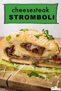 Philly Cheese Steak Stromboli is like a homemade calzone, except it's easier! Roast beef, peppers, and onions are rolled up inside frozen bread dough and baked. There's plenty of gooey cheese too! It's everything you love about a Philly Cheesesteak Sandwich or sliders but easier and quicker to make. You can use leftover ribeye steak, or another kind of steak too! It's a quick and easy lunch or dinner idea! #ad #Rhodes #frozendough #phillycheesesteaksandwich #bakedcheesesteak