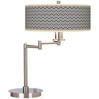 Give your décor an extra touch of style from the Zig Zag Chevron pattern giclee shade on this brushed steel CFL swing arm desk lamp.