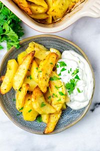 These Greek Lemon Potatoes are crispy from the outside and juicy from the inside with just the right amount of lemon flavors. Easy to make with pantry staples, delicious and foolproof with step-by-step instruction pictures. #vegan #dairyfree #contentednesscooking #vegetarian #dinner #lunch #greeklemonpotatoes #roastedpotatoes