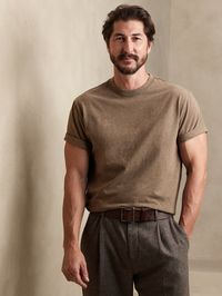 An elevated essential, this soft, 100% cotton tee is made with American-grown SUPIMA® cotton, a customer favorite beloved for its softness and strength.  Impeccably cut for an at-ease fit that's roomy without being too relaxed.  Crew neck.  Short sl