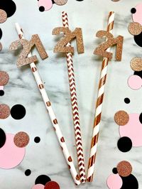 Our Glitter 21st Birthday Paper Straws will add a classy touch of sparkly fun to your 21st birthday party! You will receive a set of 10 paper straws adorned with glitter 21s measuring approximately 1.2 inches tall and 1.6 inches wide.  Go all out and place your paper straws in our personalized 21st birthday cups (at https://etsy.me/3qorj9F) on a table with our personalized confetti (at https://etsy.me/326IljX) and favor bags (at https://etsy.me/3yPeby9).  Due to the nature of glitter cardstock,