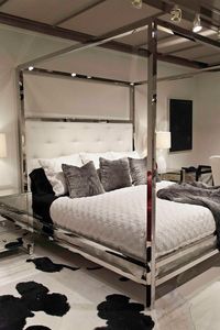 In my Future Dream Home..i plan on having a ton of guest rooms for all of our friends and family to stay in for visits..i cant wait to decorate them all..and this mirrored 4 post bed is killer!! Love it!