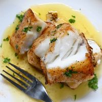 Make my restaurant-quality pan-seared Chilean sea bass recipe in 15 minutes. It's crisp outside, tender, juicy, and flaky in the middle, and served with rich lemon butter sauce!