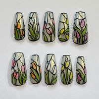 Press on nails handmade with care in Toronto, Canada! These stained glass inspired nails feature colourful spring tulips on a shimmery, semi-opaque base 🌷 🌟 Durable and Reusable  Application kit includes: - 1 cuticle stick - 1 nail buffer - 1 alcohol prep pad - 1 nail glue *Please let me know if you do not require the application kit so that I can reduce waste! 💌 Free international shipping on all orders  Sizing info: - This set include 10 nail tips custom made to your measurements -To find y