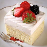 Make this amazing tres leches cake entirely from scratch with homemade milk syrup. It's not soggy yet moist, soft, and not overly sweet!