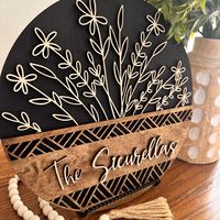 Make any space truly special with our beautifully crafted personalized wood sign. Perfect for housewarmings, bridal showers, or as a unique wedding gift, this sign adds a charming, rustic touch to any home.  Each detail is meticulously laser cut, providing a crisp and clean finish. DOES NOT COME WITH THE SHELF STAND AS SEEN IN THE PICTURES. SIZE OPTIONS: 12 inch: Perfect for shelves or small wall spaces.   15 inch: Ideal for entryways or medium-sized wall areas. 18 inch: Great for larger wall sp