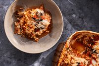 Andrea Gentl's crunchy and flavorful Mushroom Parmesan recipe pairs briny olives and capers with tomato sauce and hen-of-the-woods mushrooms.