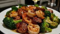   Honey Garlic Shrimp, Sausage, and Broccoli is a delicious and versatile dish that combines a medley of flavors and textures. The succulent shrimp pairs beautifully with the savory richness ... Read more