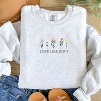 Embrace the teachings of compassion and grace with our "Love Like Jesus" Floral Unisex Crewneck Sweatshirt, tailored for devoted Christians. This faith-based apparel serves as a powerful reminder to embody the love that Jesus exemplified. With its delicate floral design, it's not just a sweatshirt, but a beautiful expression of faith. Whether worn during worship or as an everyday Christian crewneck, it speaks volumes about your commitment to Christ. This sweatshirt also makes a thoughtful gift, perfect for worship leaders, or as a meaningful token for adult and teen baptism ceremonies. Spread the message of love and faith with this Jesus Hoodie, and let your clothing be a testament to your devotion. 🤍 Features: * Unisex crewneck sweatshirt * 50% cotton, 50% polyester * Medium-heavy fabric