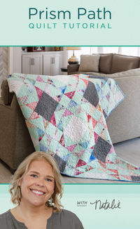 Save this Free 10 Inch Layer Cake Squares Prism Path Quilt Tutorial! Natalie is making a geometric showstopper with precut layer cake squares and Julep, Kona Cotton's 2024 Color of the Year. This gentle mint pairs beautifully with the pastels of Misty Garden by Lara Skinner for Robert Kaufman and soft black Essex Yarn Dyed Linen. The Prism Path quilt comes together quickly with half-square triangles made eight-at-a-time. Follow Missouri Star Quilt Co. for more Quilt Tutorials!