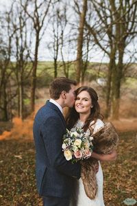 Bride & Groom photoshoot, couple photoshoot with orange smoke bomb grenade. #Woodlandwedding, #winterwedding #februarywedding #smokebomb #smokebombwedding #smokegrenadeideas #weddingportait