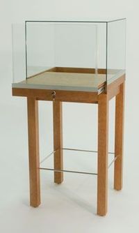 GL134 Square Museum Pedestal Display Case Shown in Light Cherry Wood Veneer