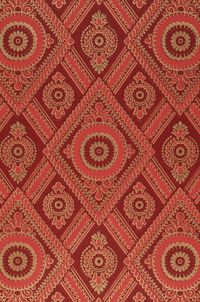 Pattern wallpaper William is based on a historical design and looks like high-quality fabric. The surface print look is reminiscent of traditional printing methods. Deep shades of red are given a luxurious touch by gold details. The perfect wallpaper for stylish offices, living rooms, entrance areas and stairways.