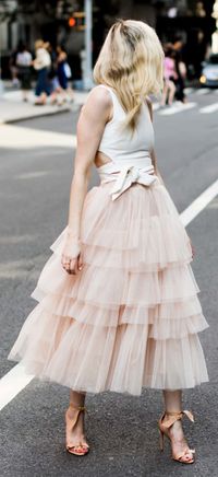 Swooning? We get it! This layered tulle skirt in a confectionary pink has us head over heels in love. Love Me More Layered Tulle Skirt  and A Fan of Bowknot Crop Top featured by Yael Steren Blog