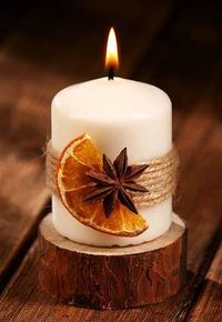 42. Uma simples fruta seca já deixa as velas de Natal lindas. Foto: Grand Deco