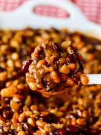 Cowboy Baked Beans are loaded with browned ground beef, crispy applewood smoked bacon and beans. A great party food side for hungry crowds!