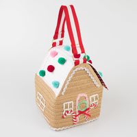 Why have a plain bag, when you can have one that looks like a gingerbread house? Our designers have pulled out all the stops to make this woven paper bag very special indeed, with lots of exciting embellishments and intricate design details! A wonderful gift for kids, or adults, who love fabulous festive accessories.