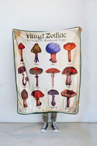 Everyone will think you're a fun guy when you bundle up in this Fungi Zodiac Sherpa Fleece Blanket. This interesting blanket is a great conversation starter and is sure to help keep you looking cool and feeling warm in any weather.