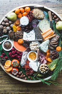 How to Make an Epic Winter Cheese Board ~ a blockbuster appetizer for winter holidays, game days, or any time hungry friends and family gather 'round. #grazing #grazingtable #appetizer #Christmas #NewYearsEve #platter #charcuterie #meats #cheese #lazysusan #meats #easy