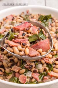 Ring in the New Year, and lots of luck, with a traditional Southern dish of Black Eyed Peas and Collard Greens! #RealHousemoms #blackeyedpeas #collardgreens #collards #sidedish #southernfood #newyearseve #newyearsday #newyear