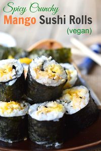 Spicy Crunchy Mango Sushi Rolls - it's easy to make these healthy and delicious vegan sushi rolls. Make a big batch for dinner and take the leftovers for lunch! A great recipe for your vegetarian friends.