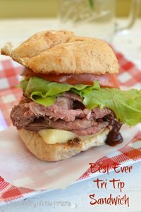 BBQ Beef Sandwiches made with smoked Tri-tip are easy to make and loaded with flavor! You could also use other kinds of beef like shredded chuck roast, or smoked brisket. Beef can be made in the slow cooker. #beefsandwiches #roastbeef #bbqbeef #littledairyontheprairie