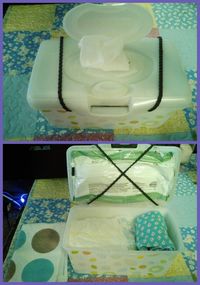 Copied this from another momma. Wipe box with small wipes attached to top. Rest of container is free to be used for diapers, extra clothes, butt cream, etc