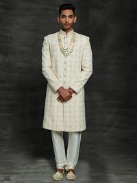 Here is the latest trending design of the silk white sherwani for wedding wear. 👉Inbox us for any Information 👉Tab on the image to buy this one online.