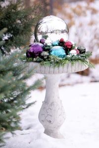 Created with gazing globes and glass ornaments, these seasonal displays deck your home with shimmer and shine.