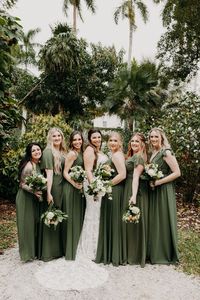 Beautiful bridal party photo taken by Taylor Shea Photography. . . .Green bridesmaid dresses, bridal party, bridesmaids, groomsman, wedding party, historic house, wedding venue, Florida wedding, Fort Myers, outdoor wedding, warm weather wedding, bride, groom, couple, marriage, wedding photography ideas, wedding inspiration.