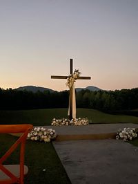 wedding cross altar with flowers