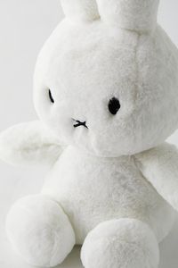 Hop into your next cuddle sesh with this plushie featuring Miffy’s classic silhouette. Perfect to display on your shelves or to add a soft finishing touch to your bed or sofa. Features Shaped plushie Miffy’s classic silhouette Versatile - use it to add a soft touch to your bed, sofa or shelves Content + Care Acrylic, polyester fill Wipe clean Imported Size Dimensions: 8" l x 8" w x 14" h Weight: 0.6 lbs | Miffy 14-Inch Plushie in White at Urban Outfitters