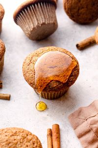 Honey dripping off of a gluten free pumpkin muffin.