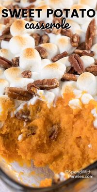 This easy Sweet Potato Casserole topped with pecans and marshmallows is a traditional side at our family Thanksgiving table. This comforting dish unites tenderly mashed sweet potatoes, brown sugar and butter with a hint of cinnamon. #spendwithpennies #sweetpotatoes #sweetpotatocasserole #casserolerecipe #Easterdinner #Thanksgiving