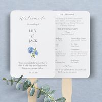 Chic and stylish. This wedding program features a welcome message and fully editable program details. The design is set against a crisp white background, with a set of contemporary fonts and a small blue hydrangea illustration. Utterly stylish and romantic with youthful undertones, this design adds just that special something to your big day. Personalize this unique design to make it yours.