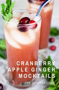 This Cranberry Mocktail is a festive nonalcoholic drink to enjoy during the Christmas holiday season! It's made with cranberry juice, apple cider, ginger beer, and lemon juice. This virgin drink is garnished with fresh mint and cranberries. It's light and refreshing! This mocktail is lightly sweet and easy to prepare. Feel free to add alcohol if you'd like to make it into a cocktail. Everyone will love this fun mocktail for the holidays.