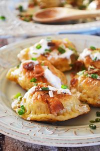 Bacon, Cheddar, and Caramelized Onion Potato Pierogi! These pierogi (or perogies, or however you like to spell it) are so delicious and they're surprisingly easy to make. Seriously, you can do it! They make great appetizers, too!